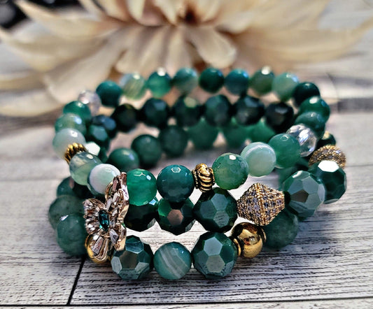 Shades of green w/butterfly charm.